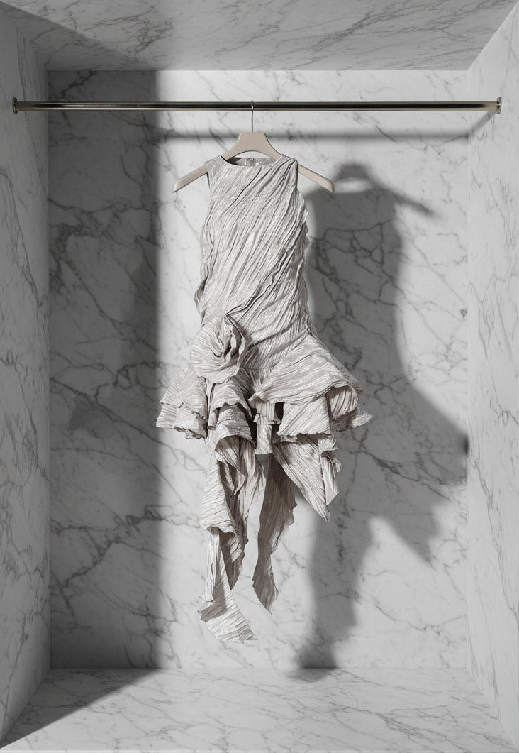 Textured dress with ruffled layers on a white background